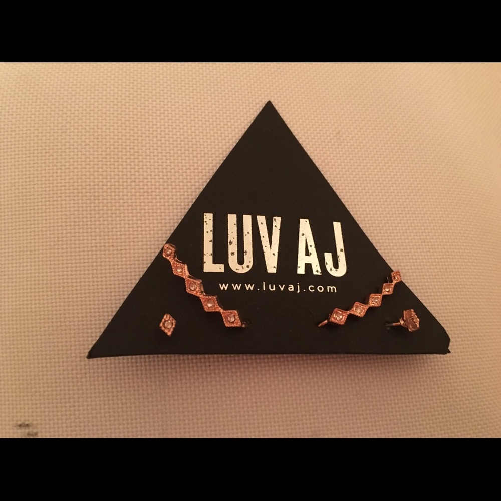 LUV AJ never worn rose gold crawler earnings